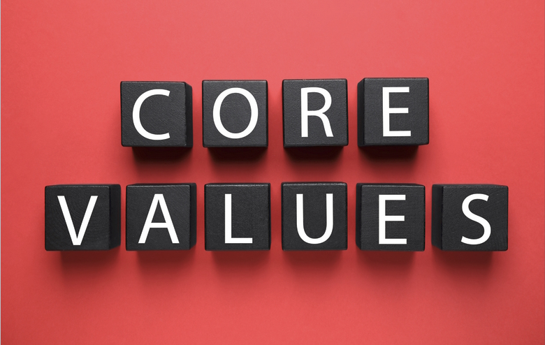 Core value spelled out red background with black blocks and white writing